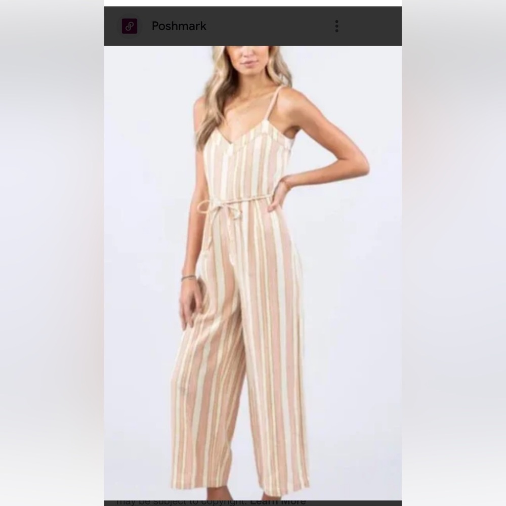 Ripcurl jumpsuit. Pink, cream and tan striped. Brand new never worn